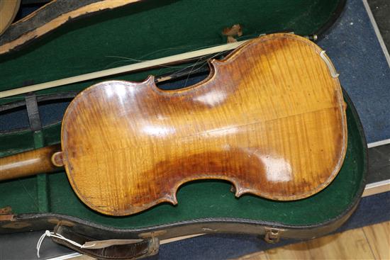 A full sized cased violin with bow